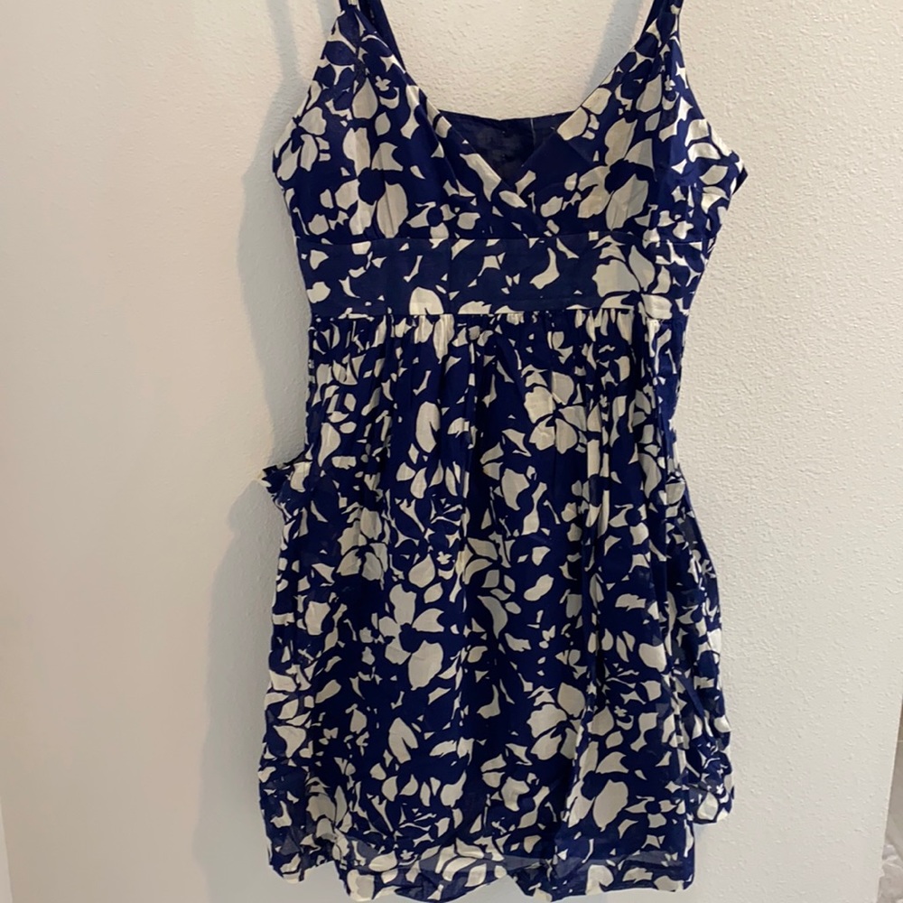 Linen sundress with pockets and button details